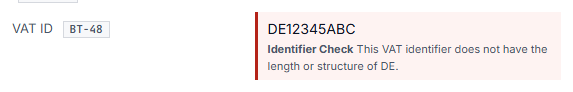 Screenshot of a field marked in red with the VAT ID “ATU123456789”, below which the sentence states that this VAT identification number does not have the length or structure for AT.
